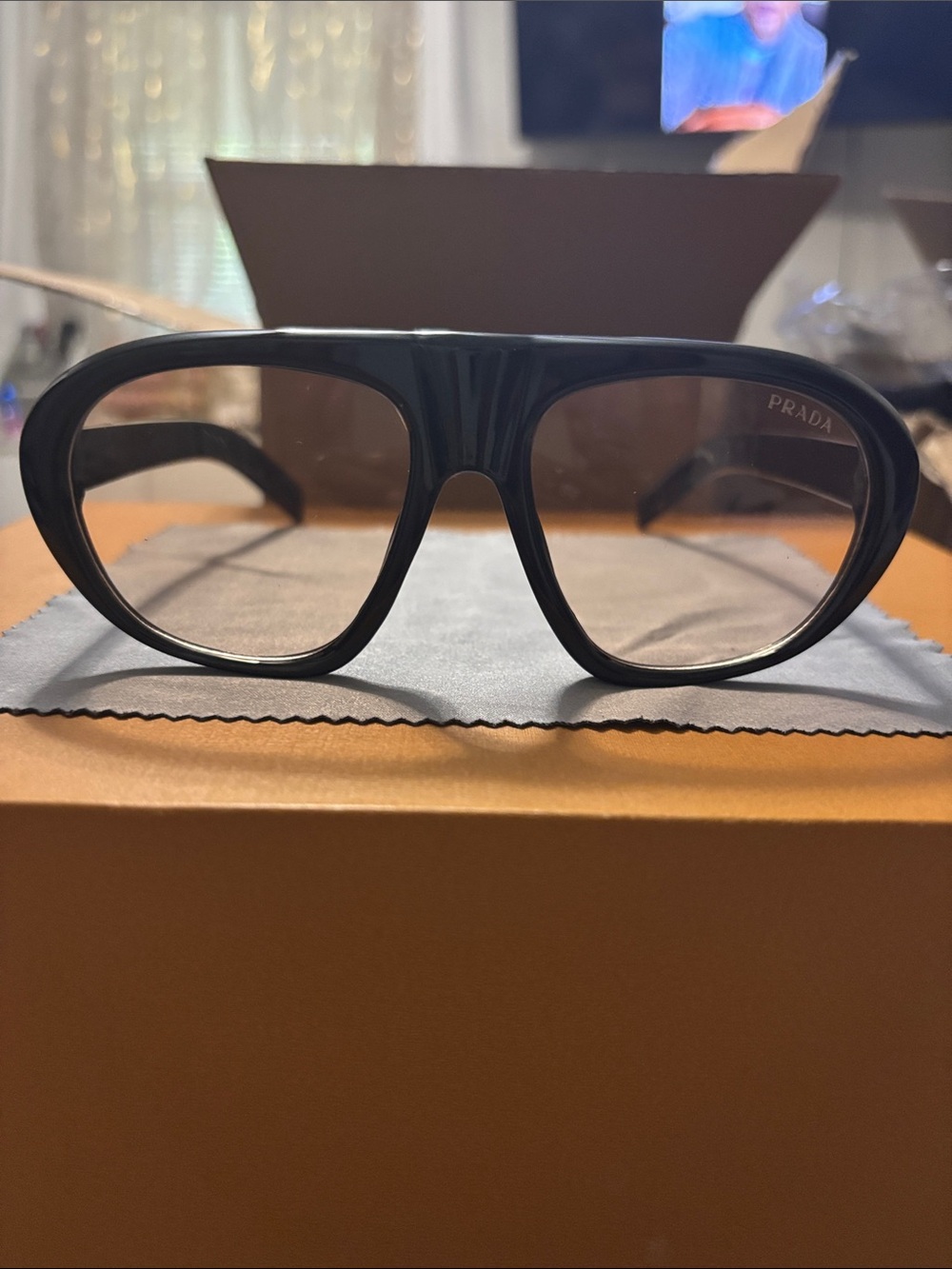 Prada Black Frame Sunglasses with Tinted Lenses
